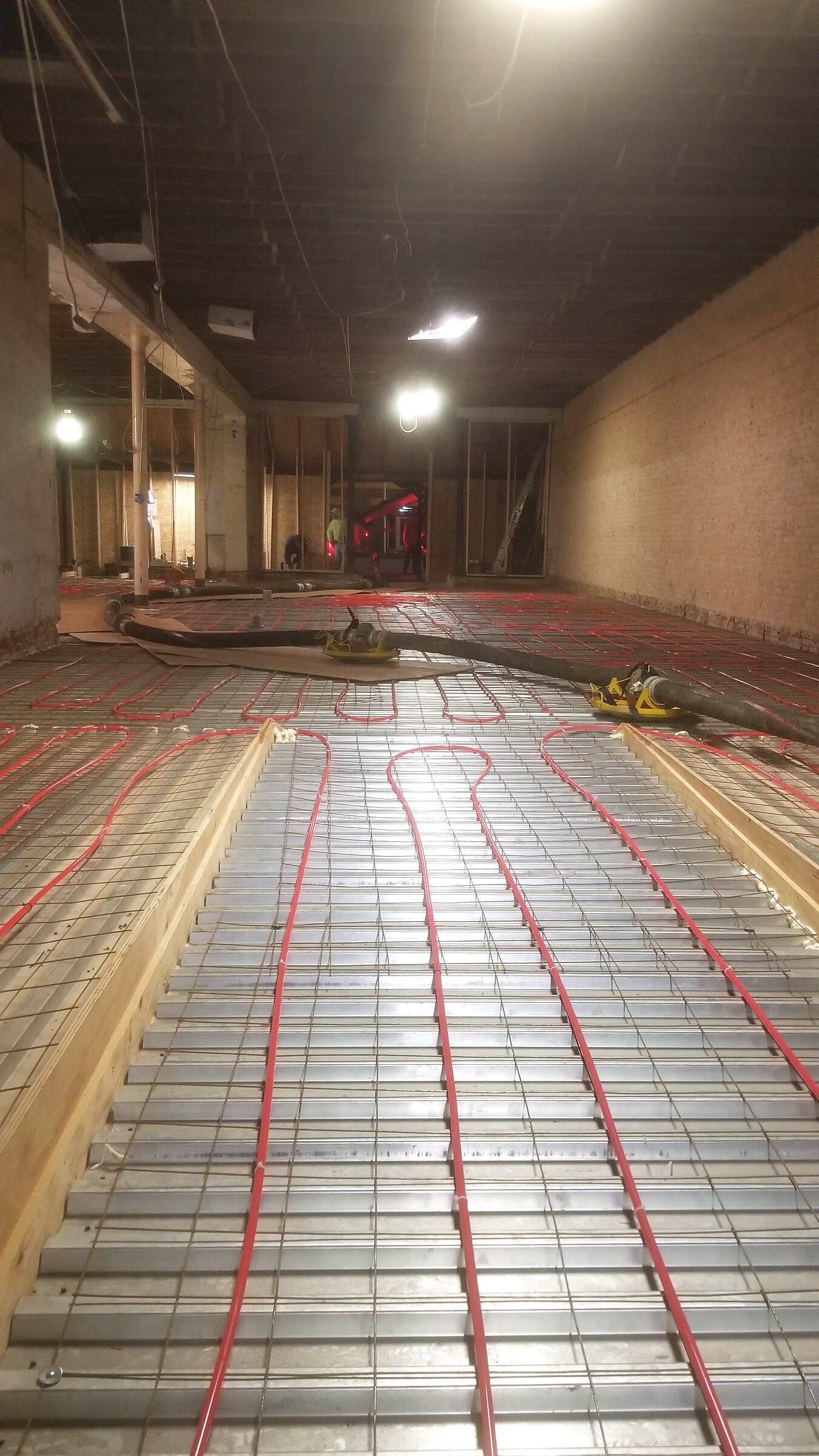 Radiant floor tubing installed before the new concrete slab