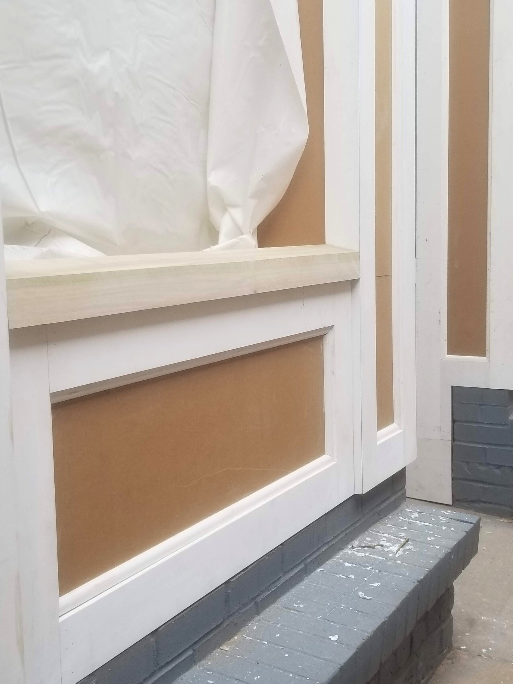 Millwork and trim detail protected during finish work